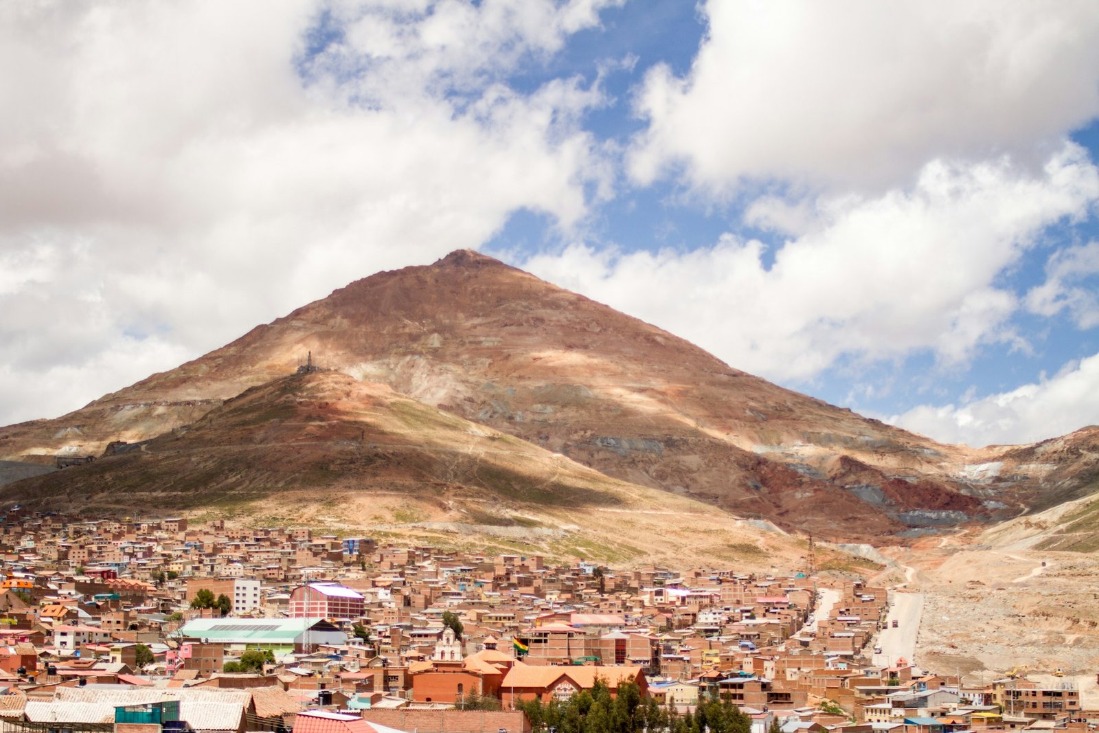 Capture the eerie glow of miners at work deep inside cerro rico's ancient mines in potosí